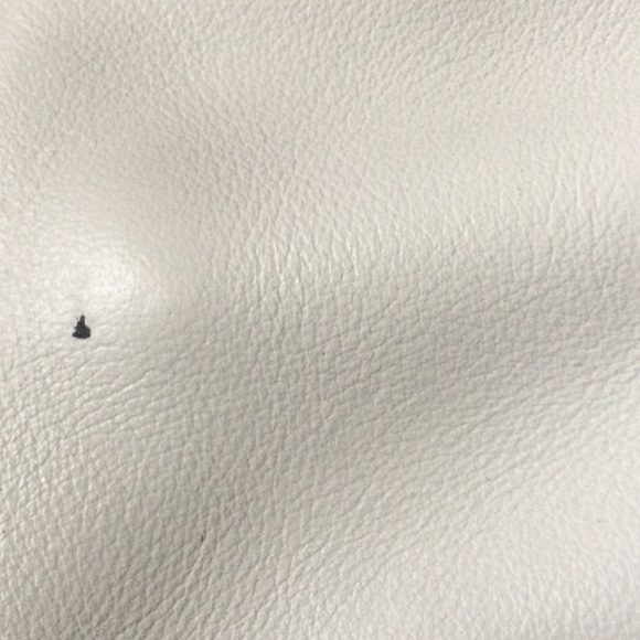 Vintage tan crossover leather purse. Has a Mark on back long adjustable strap. - Picture 3 of 4